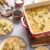 Überbackenes Hähnchen mit Reis und Käse Rezept